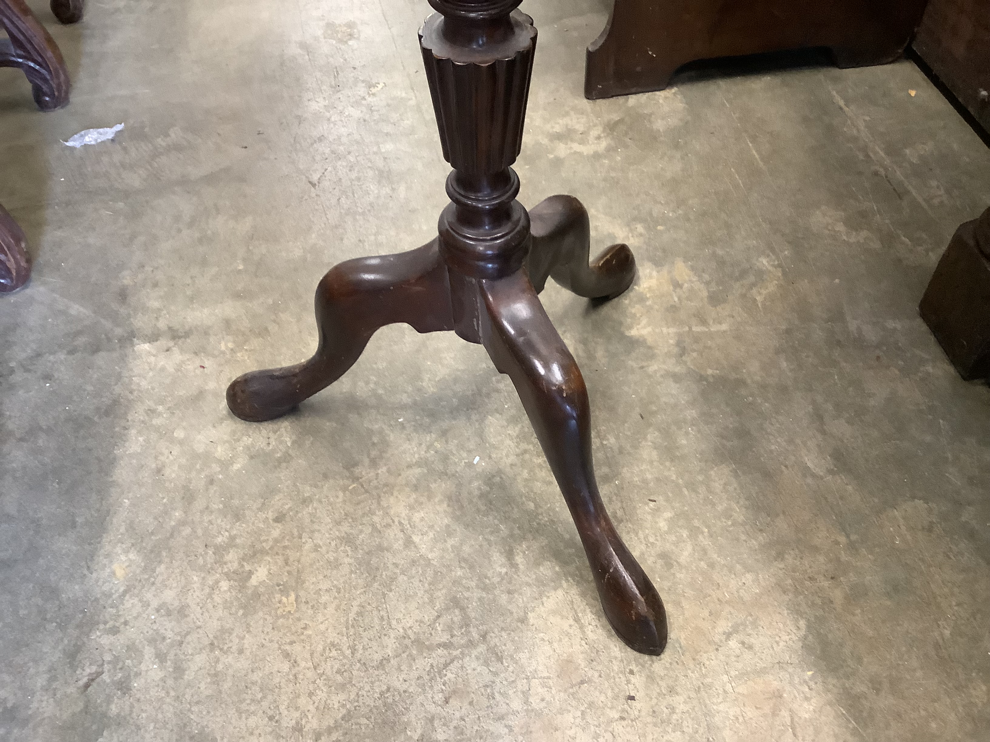 A mahogany torchere, height 122cm